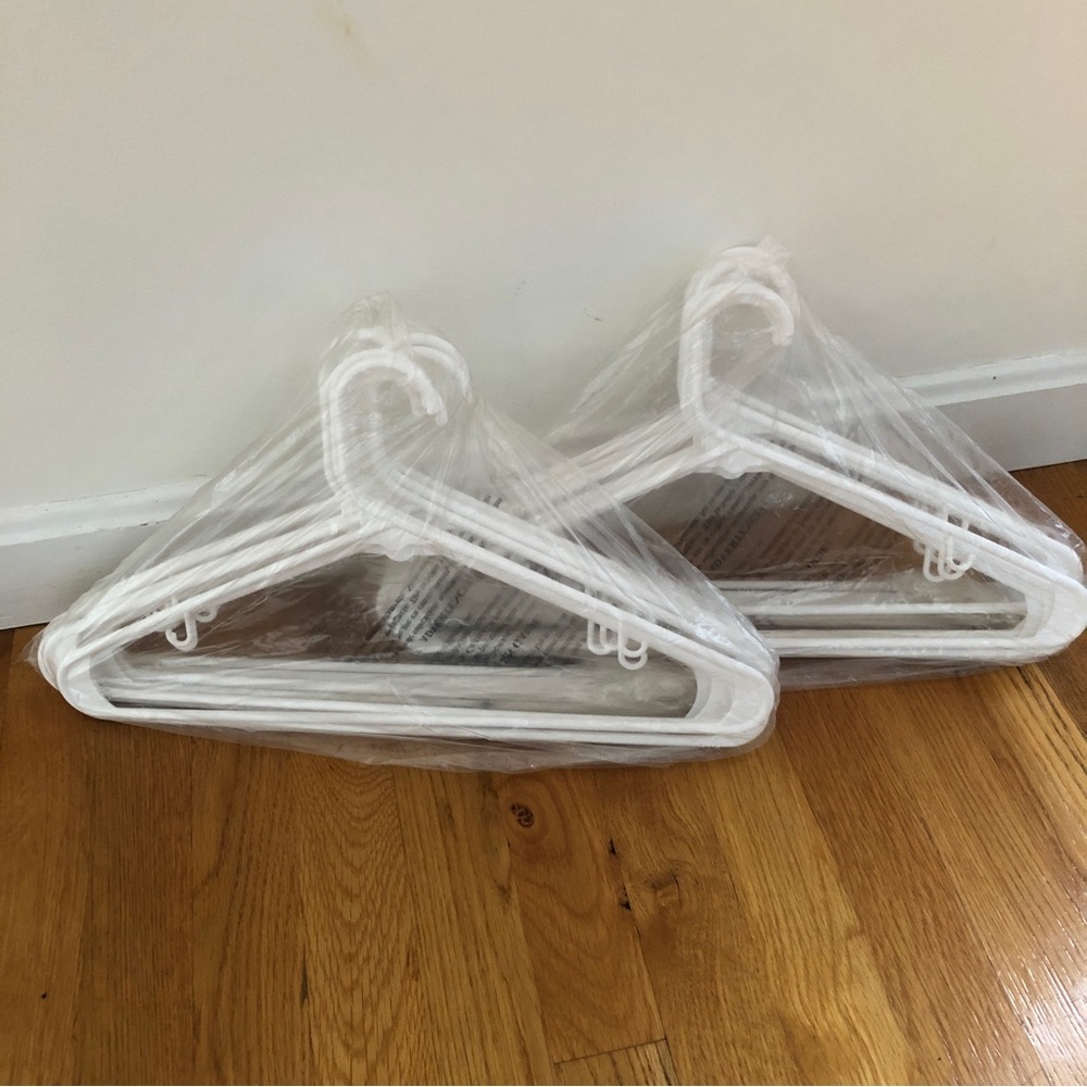 White plastic hangers with inside loop